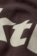 AT - PARIS LOGO TOP - BROWN